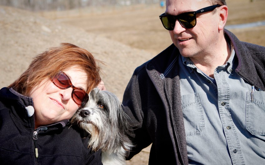 Tashi-stealing-a-snuggle-between-shots-she-gives-Corinne-her-paw-of-approval