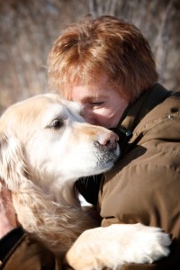 Kayla-the-golden-retriever-giving-her-person-Shelly-a-hug