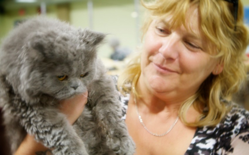 Cyndi-holding-Sir-Rudy-the-Selkirk-Rex-cat