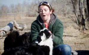 Patty-and-her-dog-Rocky-sitting-on-a-log-at-Southland-Park